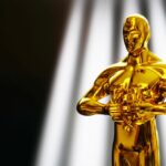 Hollywood,Golden,Oscar,Academy,Award,Statue,On,Light,Rays,On