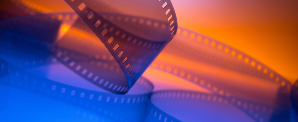 Multicolored,Cinema,Background,With,Film,Strip